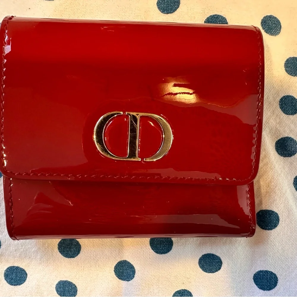 CHRISTIAN DIOR cherry patent leather wallet / card holder. Gold accents.